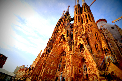 he Basílica i Temple Expiatori de la Sagrada Família is a large Roman Catholic church in Barcelona, designed by Spanish architect Antoni Gaudí (1852–1926).